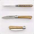 5 Coqs Pocket Knife, top-down view of open blade & oak handle with mother of pearl inlay. Handcrafted details, 100% Made in France.
