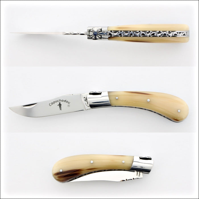 Capuchadou 10 cm Guilloche Folding Knife, horn tip handle detail. Handcrafted details, 100% Made in France.