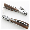 Chateau Laguiole Melchior Burled Walnut Handle, close-up of open and closed corkscrew. Handcrafted details, 100% Made in France.