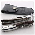 Chateau Laguiole Melchior Ironwood Handle corkscrew, close-up of the dark wood handle and polished steel. Handcrafted details, 100% Made in France.