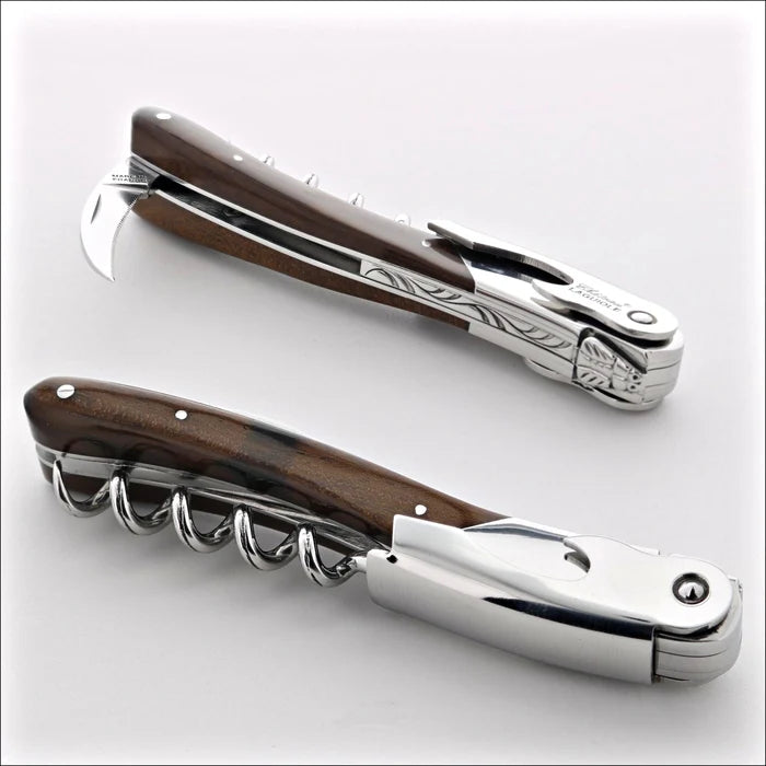 Chateau Laguiole Melchior Ironwood Handle, top-down view of two corkscrews. Handcrafted details, 100% Made in France.