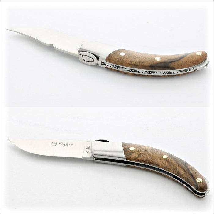 Corsican Rondinara Folding Knife, close-up of burled walnut handle with intricate metalwork. Handcrafted details, 100% Made in France.