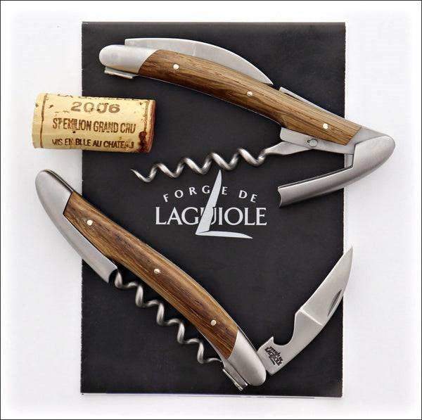 Forge de Laguiole corkscrew, top-down view of sub-fossilized oak handles with satin steel hardware.