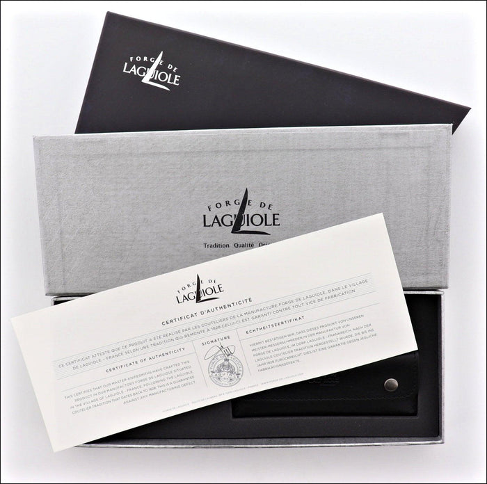 Forge de Laguiole Corkscrew box set, top-down view showing authenticity certificate and black case.