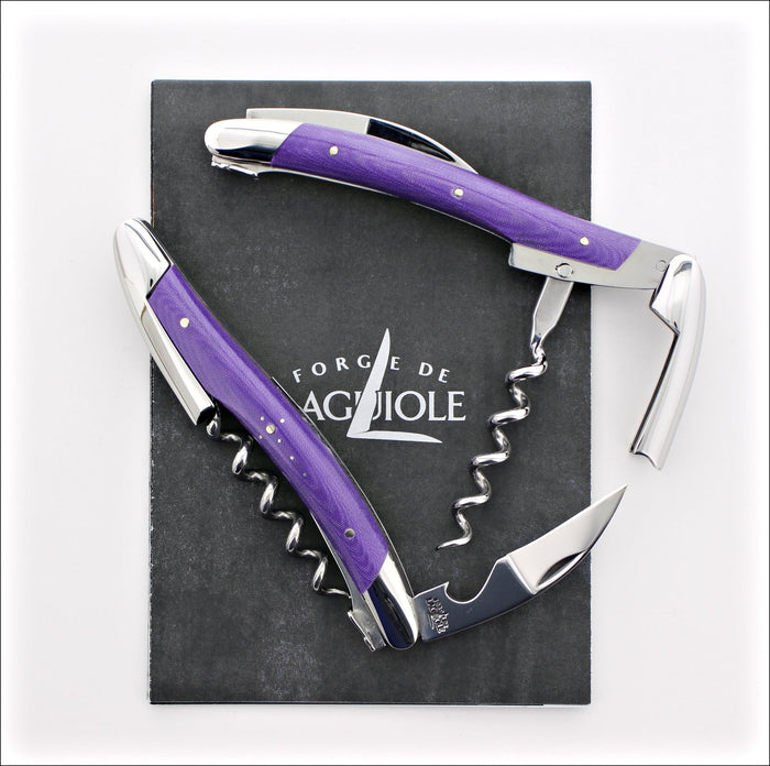 Forge de Laguiole Corkscrew, top-down view of two purple compressed fabric handles with steel accents.