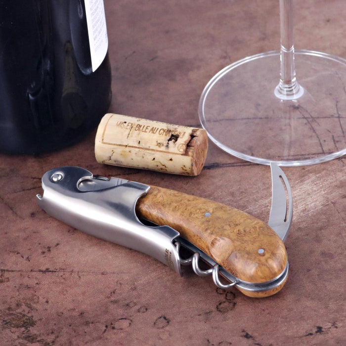 Laguiole Magnum Amboyna Burl Corkscrew, close-up of the elegant burl wood handle and stainless steel body.