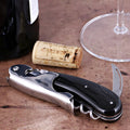 Laguiole Magnum Black Horn Tip Corkscrew, close-up of polished stainless steel and black handle.