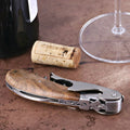Laguiole Magnum Corkscrew Deco Freemason - Burled Walnut, close-up of the handle and silver mechanism.