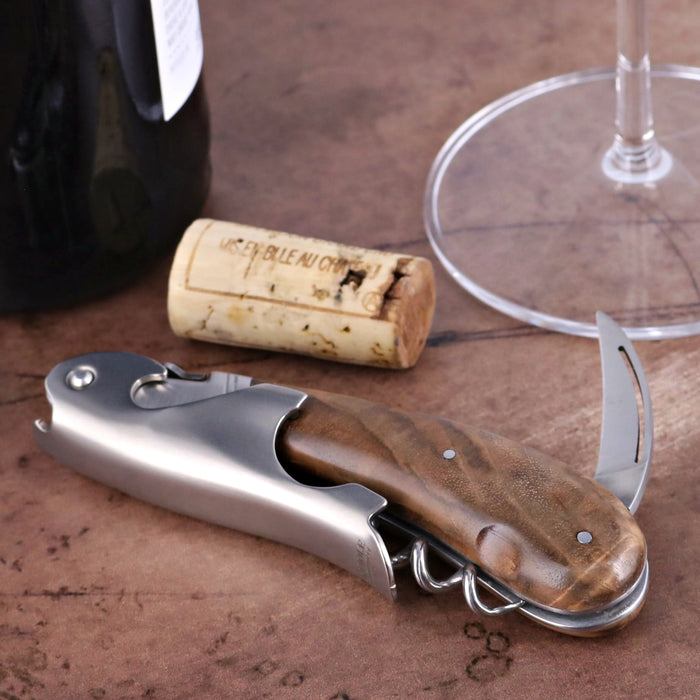 Laguiole Magnum Corkscrew Deco Freemason - Burled Walnut, close-up of the wood handle and stainless steel body.
