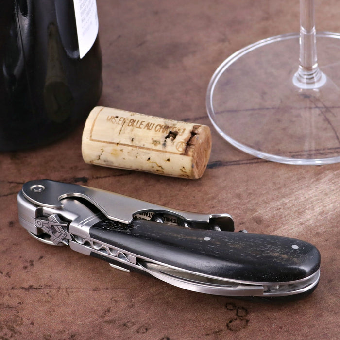 Laguiole Magnum Corkscrew Deco Freemason - Ebony, close-up of the dark wood handle and silver metal.