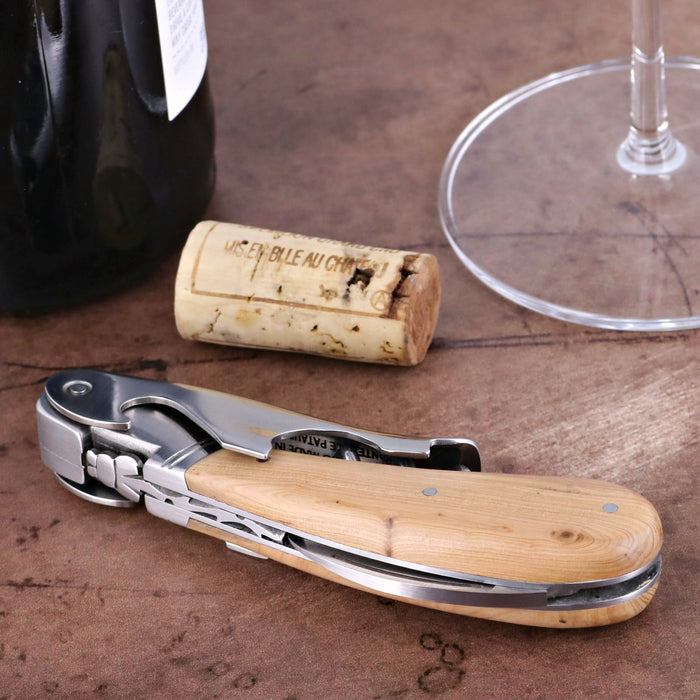 Laguiole Magnum Juniper Corkscrew, close-up side view of wooden handle and metal components.