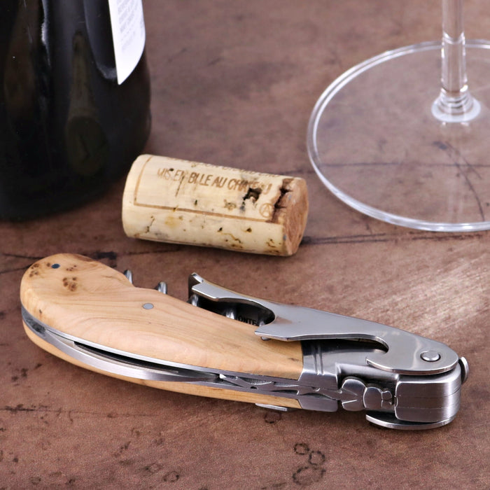 Laguiole Magnum Juniper Corkscrew, close-up side view of light wood handle and stainless steel tools.